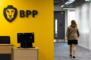 BPP Aldgate with person walking along corridor