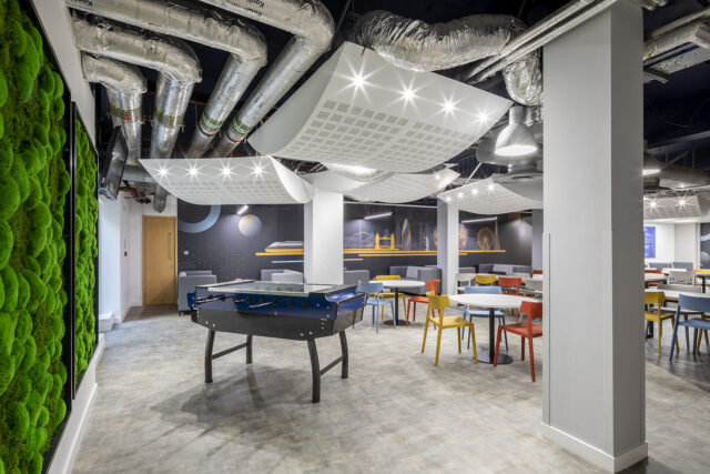 BPP campus showing student area with tables, chairs, table football