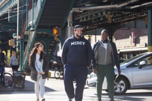 2 Mercy students walking along street