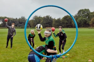 Bangor University sports society students in Quidditch match