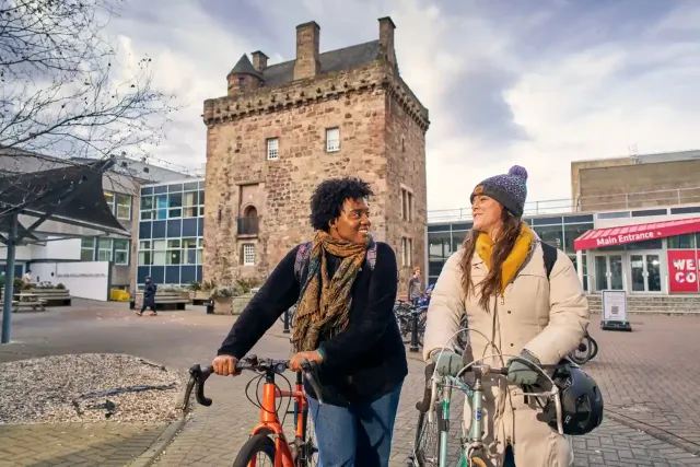 Students with bicycles at Merchiston campus, Edinburgh Napier University