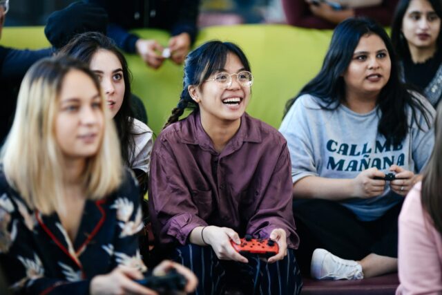 Group of students playing computer games