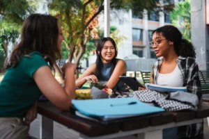 Group of students sat outside