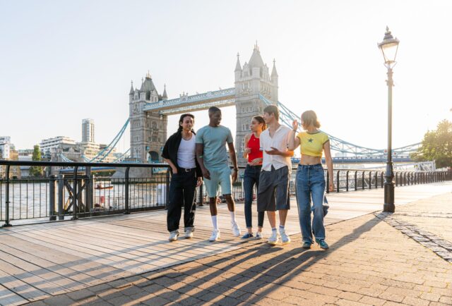 Group of students stood in front of Tower Bridge on the southbank
