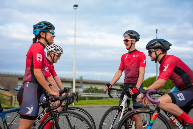 Group of Dundee students cycling together on campus