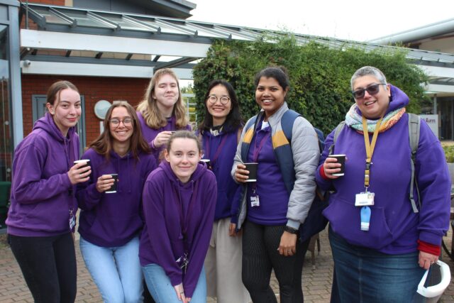Group of Lincoln Bishop University students wearing purple