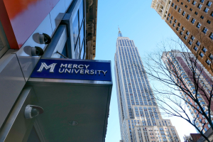 Mercy University entrance with Empire state in the background