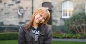 Student smiling on campus